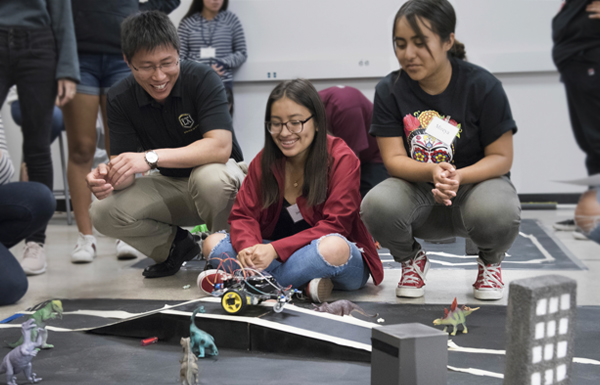 LaunchPad participants build a robot with a Cal State LA Professor
