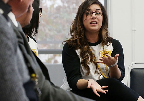 Student participating in conversation