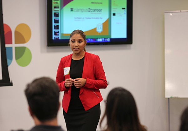 Student makes a business presentation at company