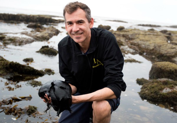 Pat Krug holding a sea hare