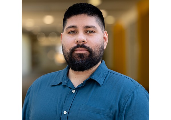 Professor Letona wearing a blue shirt
