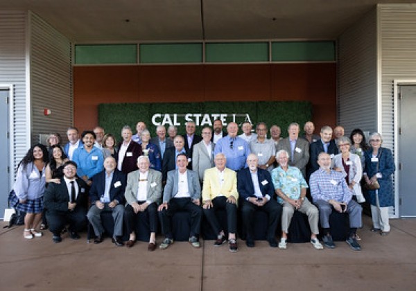 Group of Sigma Nu Alumni posing for group photo.