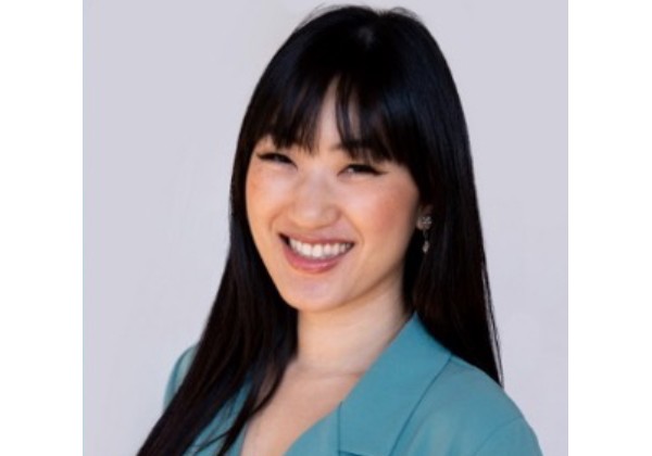 Dr. Wu wearing a light blue blazer