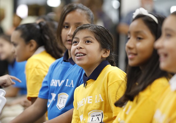 Children in Achieve LA shirts