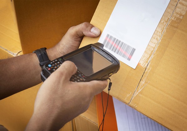 person scanning shipping label