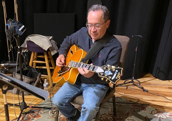 Dave Askren playing guitar