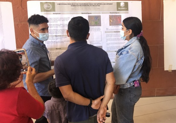 student presenting poster