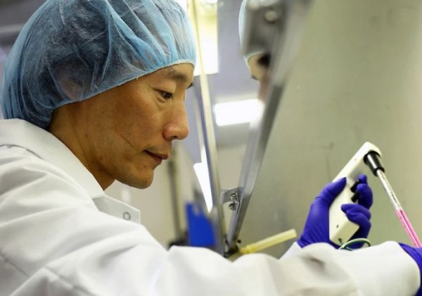 synova scientist, john chi, conducting research