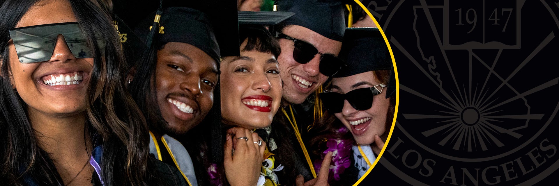 Commencement website banner with group photo and University seal