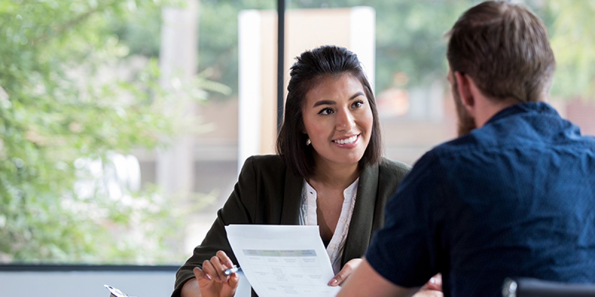 Image of Business Woman Interviewing an Applicant