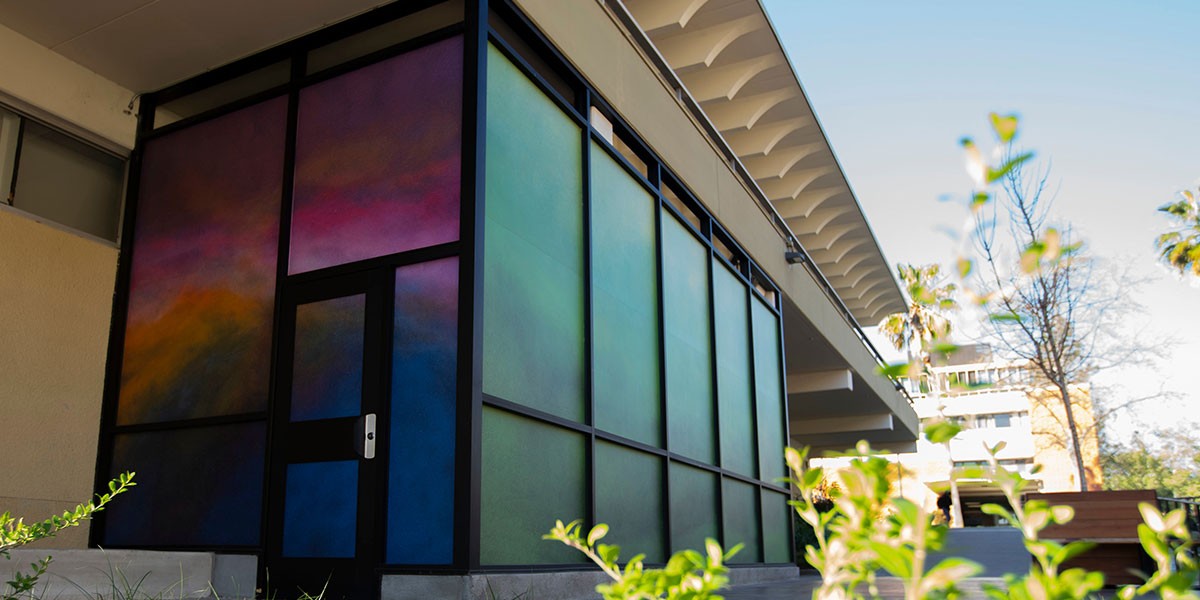 Paintings on Student Health Center windows in garden