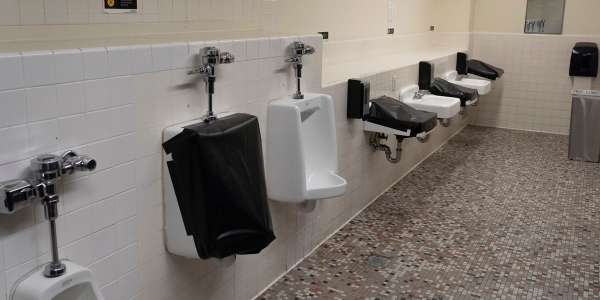 covered sinks and urinals to ensure social distancing