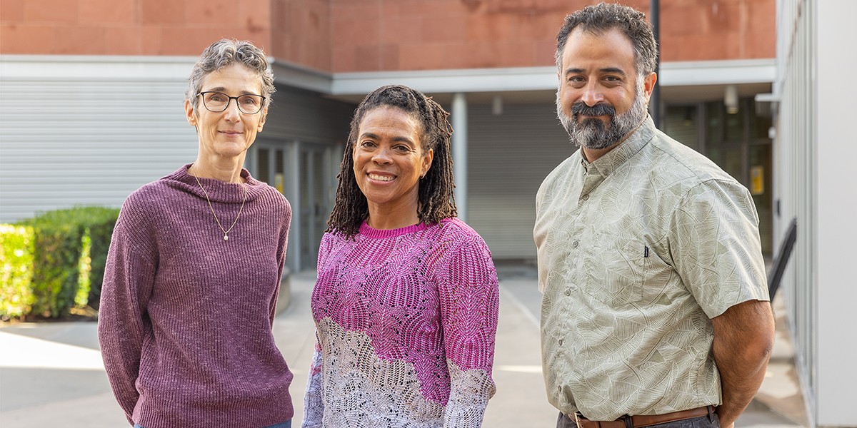 Dr. Porter standing next to Dr. Foster and Dr. Aguilar