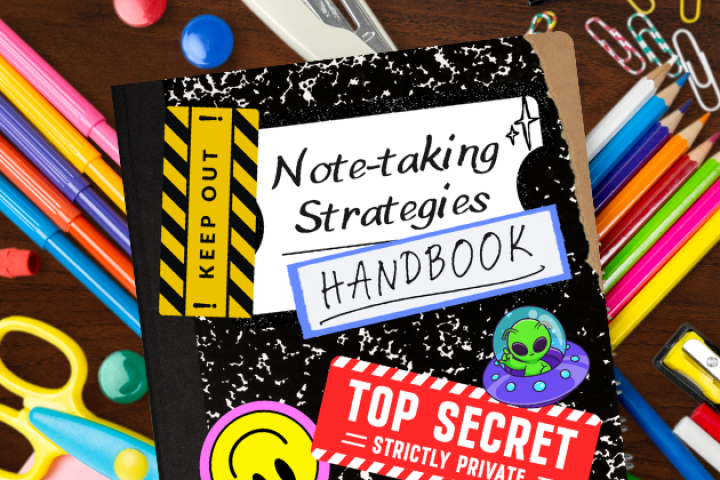 Note-taking Strategies Handbook covered in stickers in front of a bed of school supplied on a wood table.