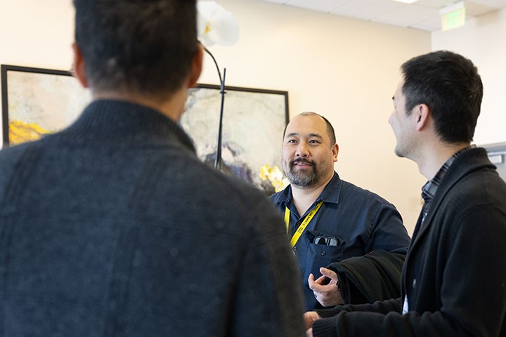 Staff mingling at AAPI reception