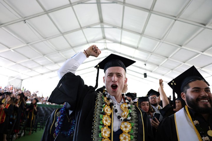 Graduate celebrating