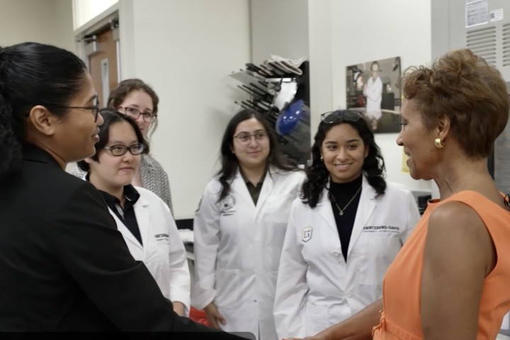 Students speaking to Bonnie Boswell