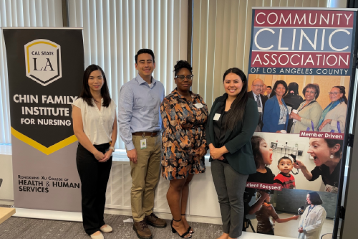 Students posing at the community clinic event.