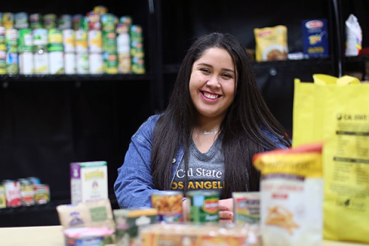 Smiling student in food pantry