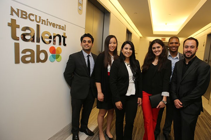 Students in suits near wall in NBC Universal talent lab