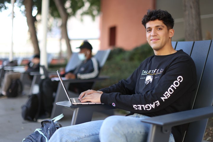 A student sitting in a chair.