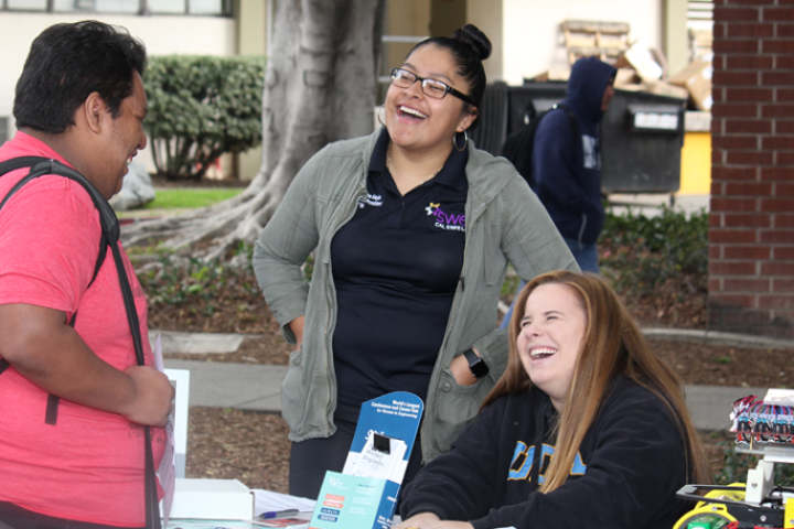 students laughing outdoors