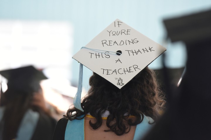motto on graduation cap.