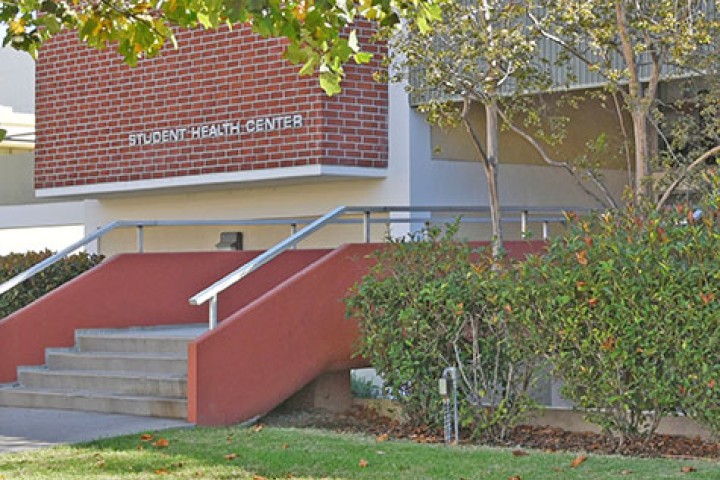 Exterior of a brick building labeled Student Health Center.