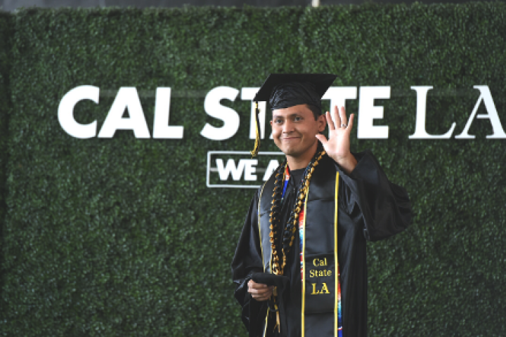 Cal State LA Student at Graduation Waving
