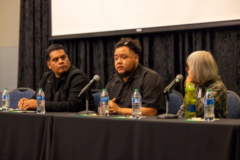 Panelists Alberto Tlatoa from South Central Farm, Cristian Marroquin from Community Services Unlimited, and Florence Nishida from Green Grounds sitting on the panel