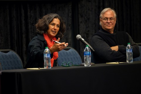 Dr. Ángela Vergara and Dr. Barry Hibbs sitting at the panel