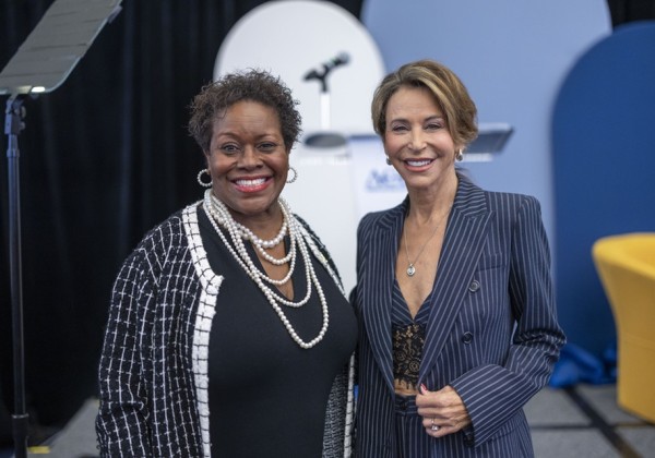 Two attendees smile together during an ACE event at Cal State LA.