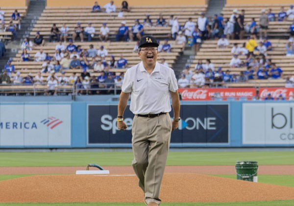 Cal State LA Interim President walking on the pitching mound at Dodger Stadium.