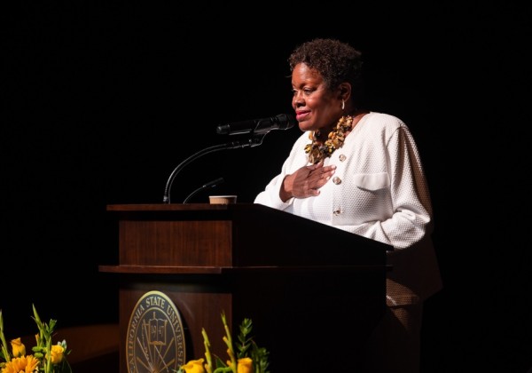 Speaker delivers remarks at a podium on stage during Cal State LA Convocation 2026. 