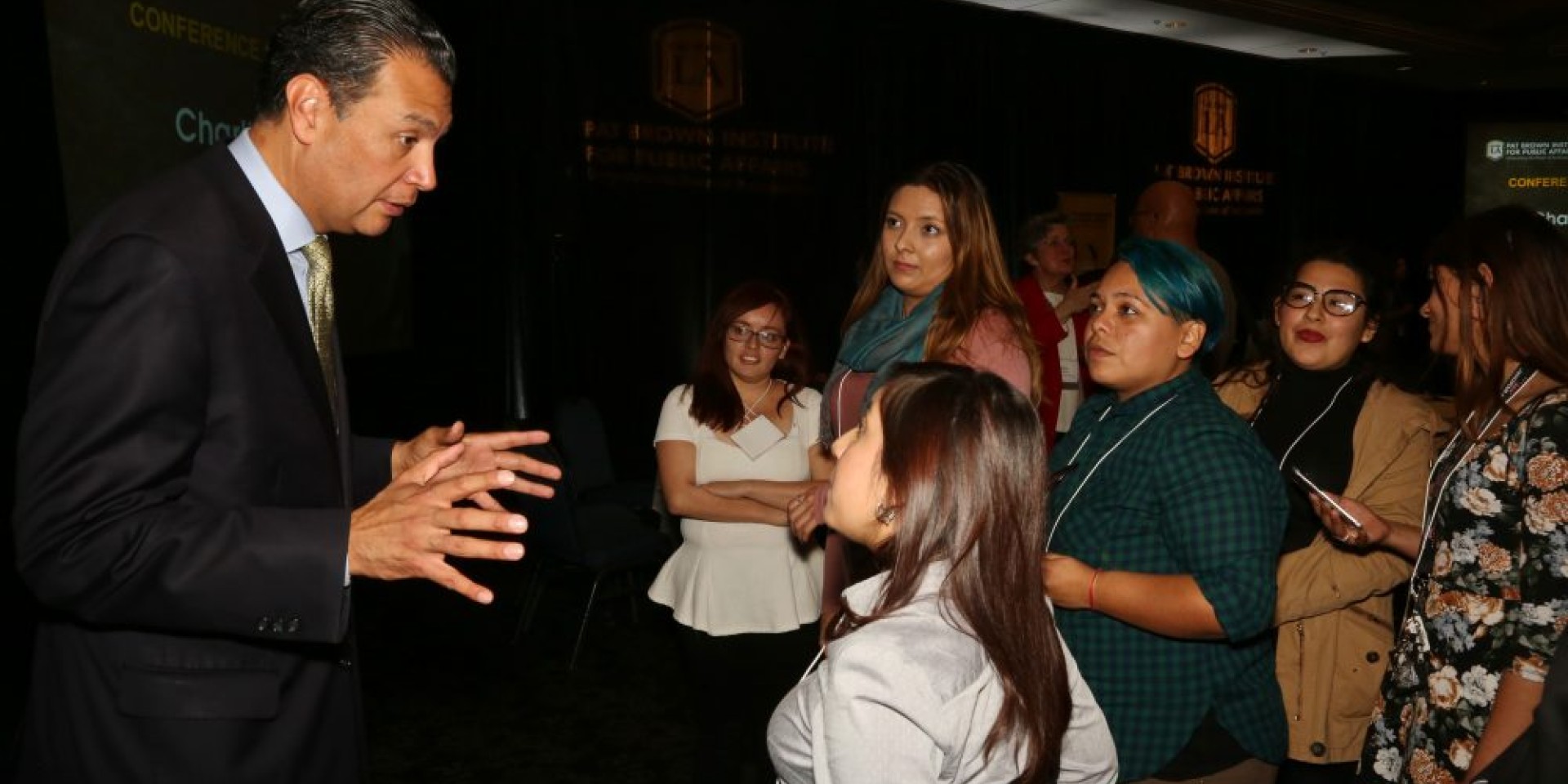 Elections Speaker engaged in conversation