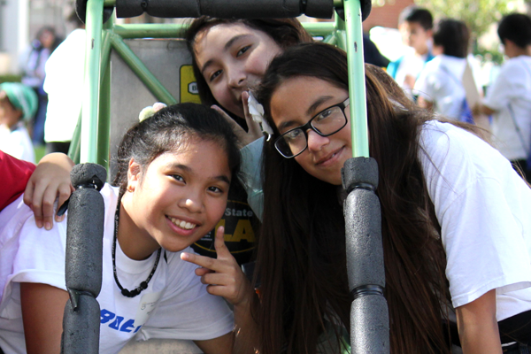 smiling girls in baja car