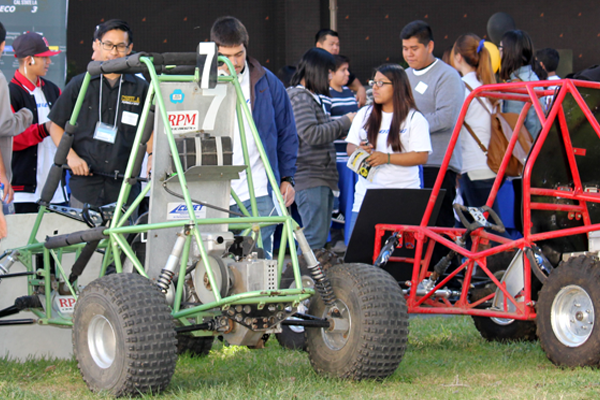 green and red baja cars in crowd