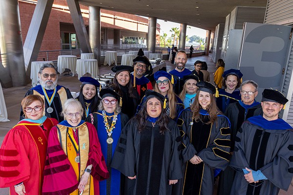 COE educators in their regalia in preparation for honors convocation