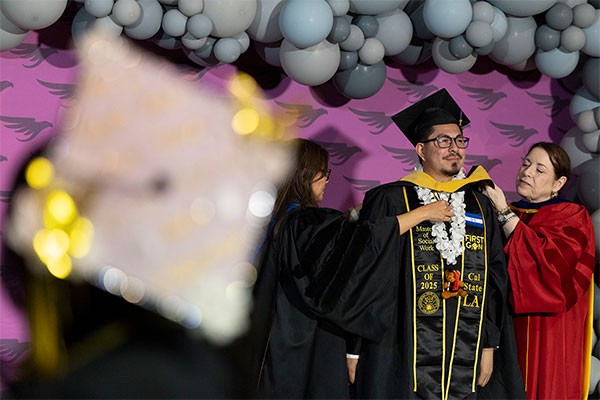 Student being hooded