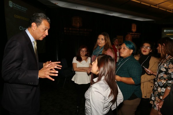 Elections Speaker engaged in conversation