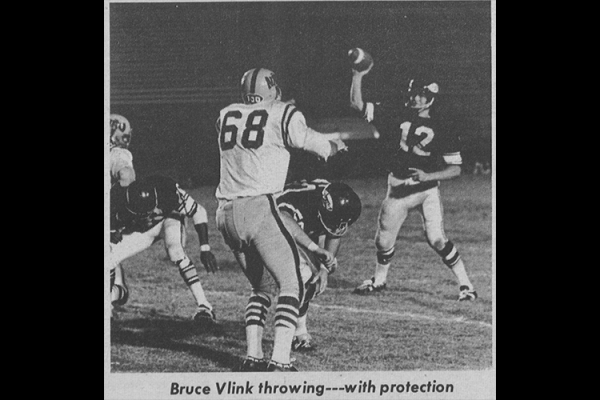 Football play (Bruce Vlink) throwing football in 1969