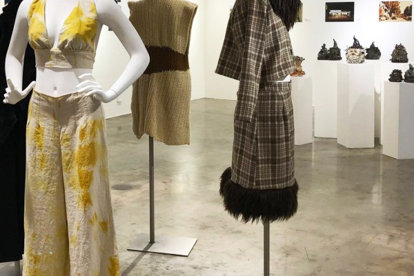 Mannequins in stylish clothing on display in the Ronald H. Silverman Fine Arts Gallery