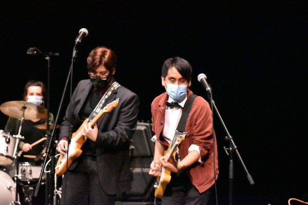 Two guitarists, commercial music ensemble
