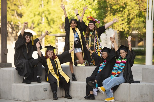 students celebrating graduation