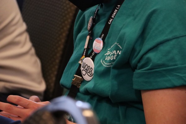 Student with WGSS Pins on a lanyard