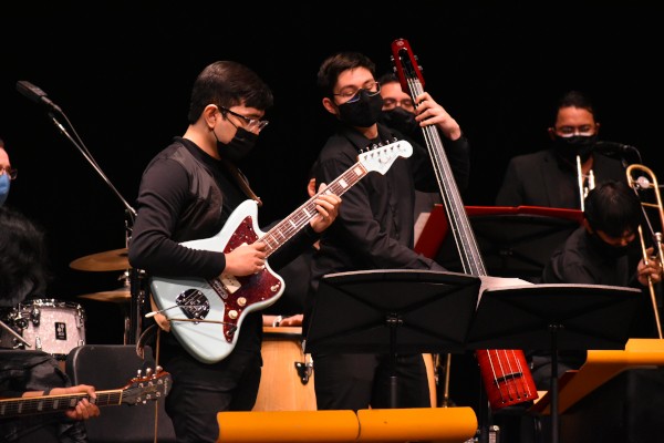 Three students playing in Jazz Big Band