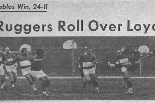 Men on soccer field. Text: Ruggers Roll Over Loyola. Diablos win 24:11