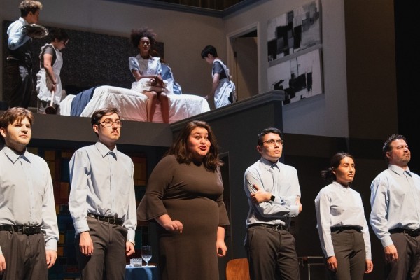 Six cast members downstage and four cast members upstage/above in a scene from "We the Invisibles"