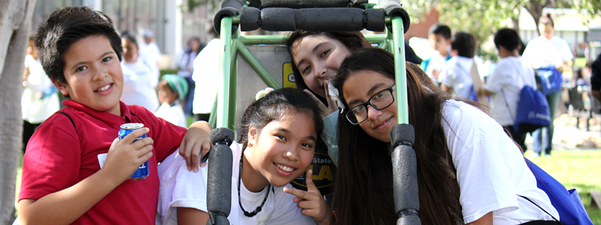 smiling kids in baja car