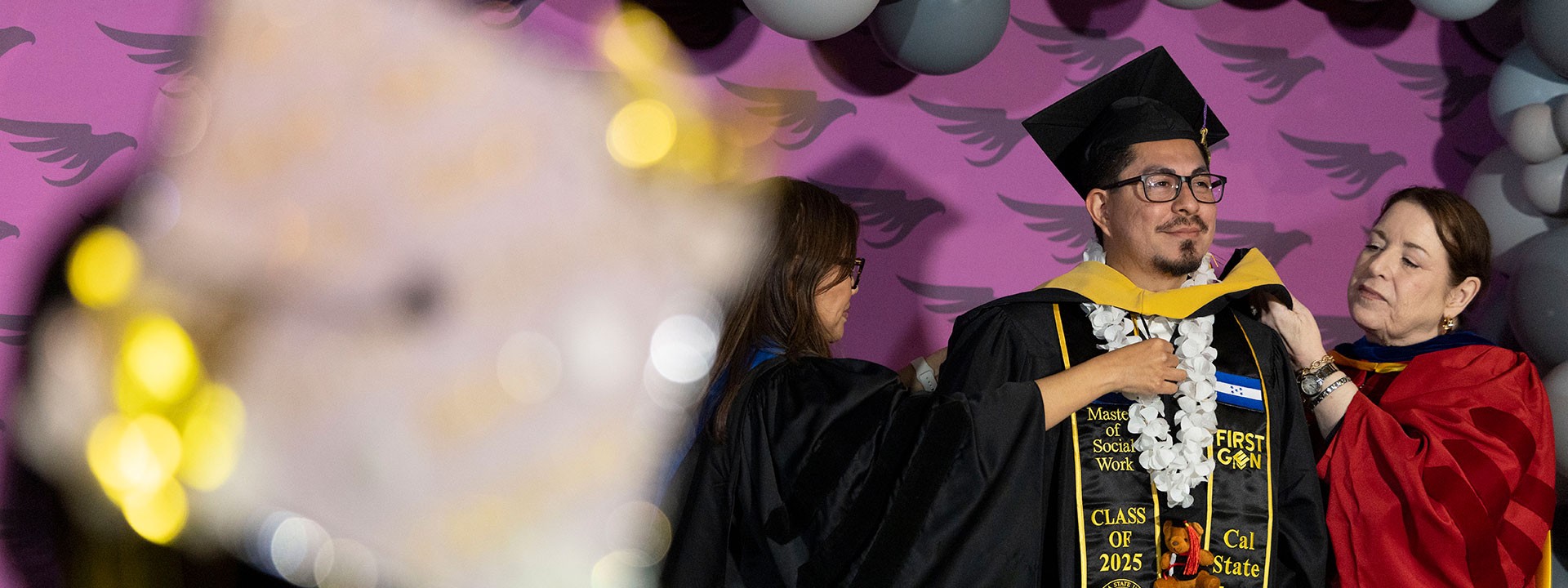 Student being hooded